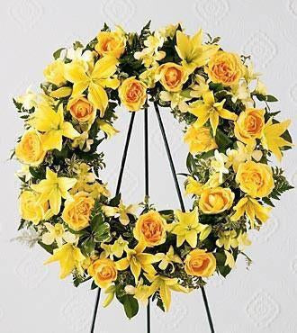 The_FTD_Ring_of_Friendship_Wreath_0c292617-4aab-45e3-a464-51164acc180e_large-a.jpg